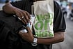 An Open Letter To The ‘East’: Who Are ‘We’? Representative Image/Getty Images : A customer carries take-out food from a McDonald's Corp. restaurant