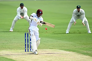 (Darren England/AAP Image via AP) : An action of West Indies' Alick Athanaze batting against Australia on the third day of their cricket test match in Brisbane, Saturday, Jan. 27, 2024.