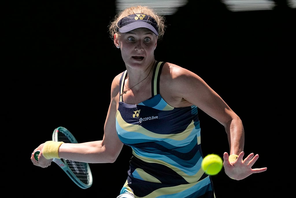 AP Photo/Louise Delmotte : Dayana Yastremska of Ukraine plays a forehand return to Linda Noskova of the Czech Republic during their quarterfinal match at the Australian Open 2024
