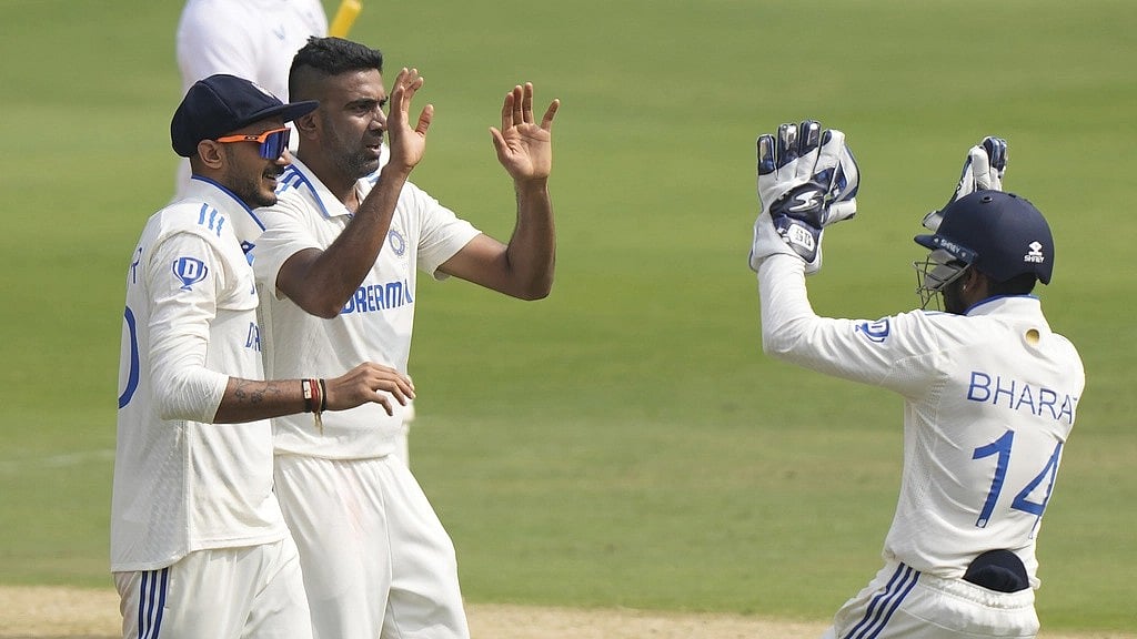 Mahesh Kumar A. : India's Ravichandran Ashwin, second left, celebrates with teammates