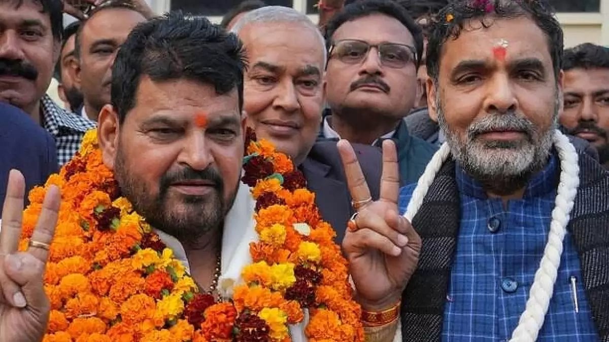 Sanjay Singh (right) with Brij Bhushan Sharan Singh (left) 
 - X/ Shiv Aroor