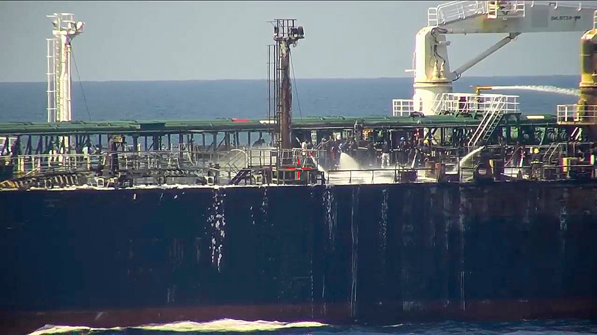 Navy puts out fire on attacked ship
