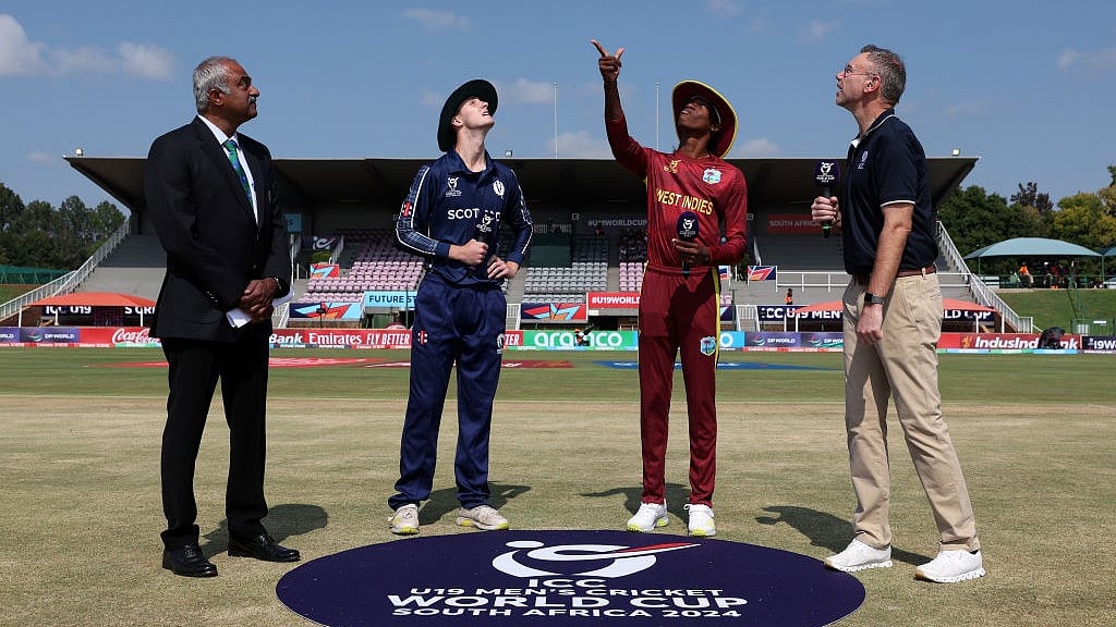 Courtesy: Windies Cricket | X : West Indies captain Stephan Pascal and Scotland skipper Owen Gould at the toss for their ICC U-19 Cricket World Cup 2024 match in Potchefstroom, South Africa.
