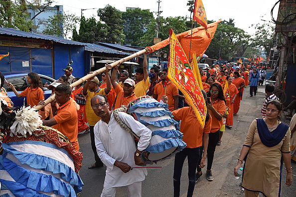 Getty Images : Hindu devotees hold the idol of Lord Ram while taking part in the Ram Navami rally.