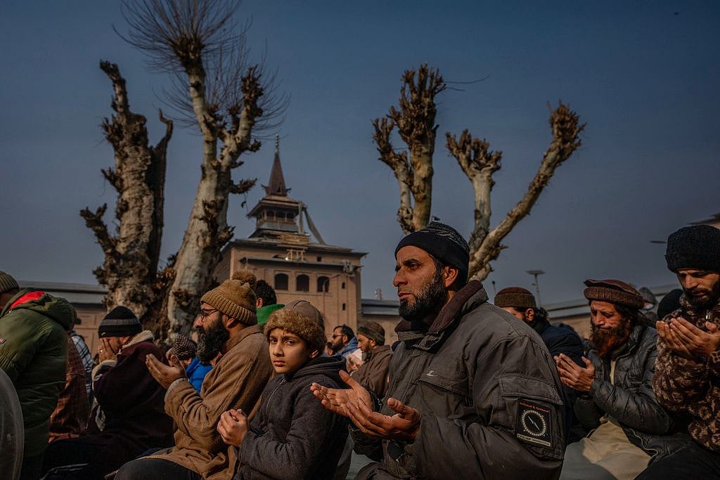 File Photo  : Kashmiris gathered at the Grand Mosque in Srinagar.