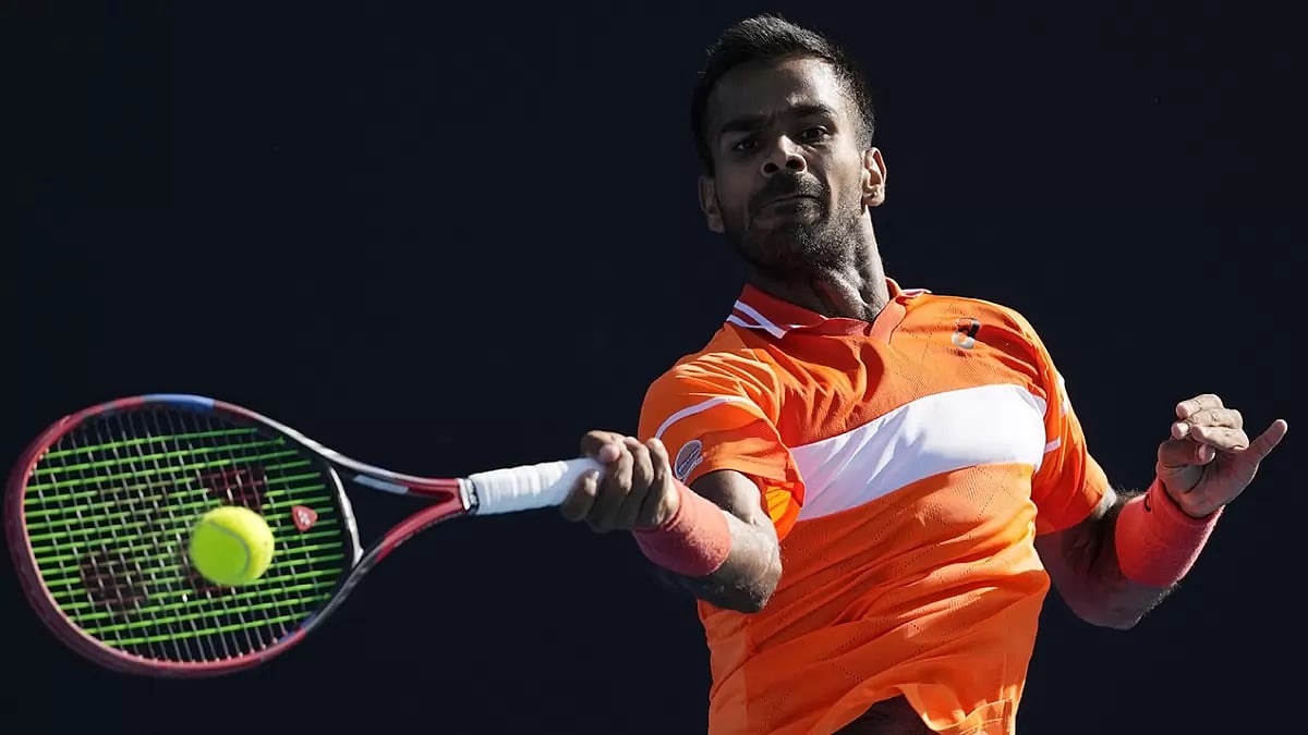 Photo: AP/Alessandra Tarantino : India's top-ranked singles tennis player Sumit Nagal in action at Australian Open 2024.