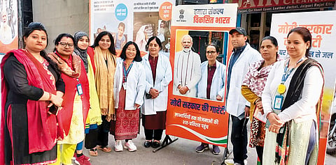 Posing with the PM: Healthcare personnel at a selfie booth in Delhi 