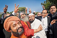 What Does Ram Mandir Mean To An Ordinary Indian? Photo: PTI : Momentous: Hindus and Muslims celebrate the Ayodhya verdict outside the Supreme Court in New Delhi in 2019