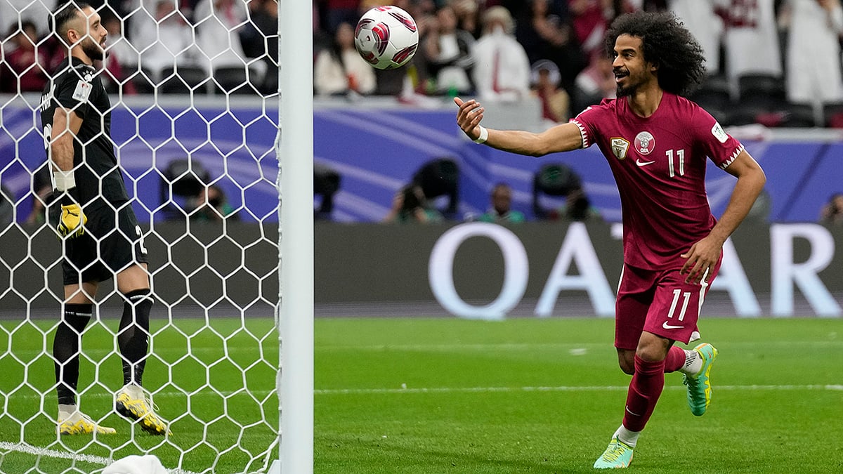 Photo: AP/Aijaz Rahi : Qatar came from behind to beat Palestine