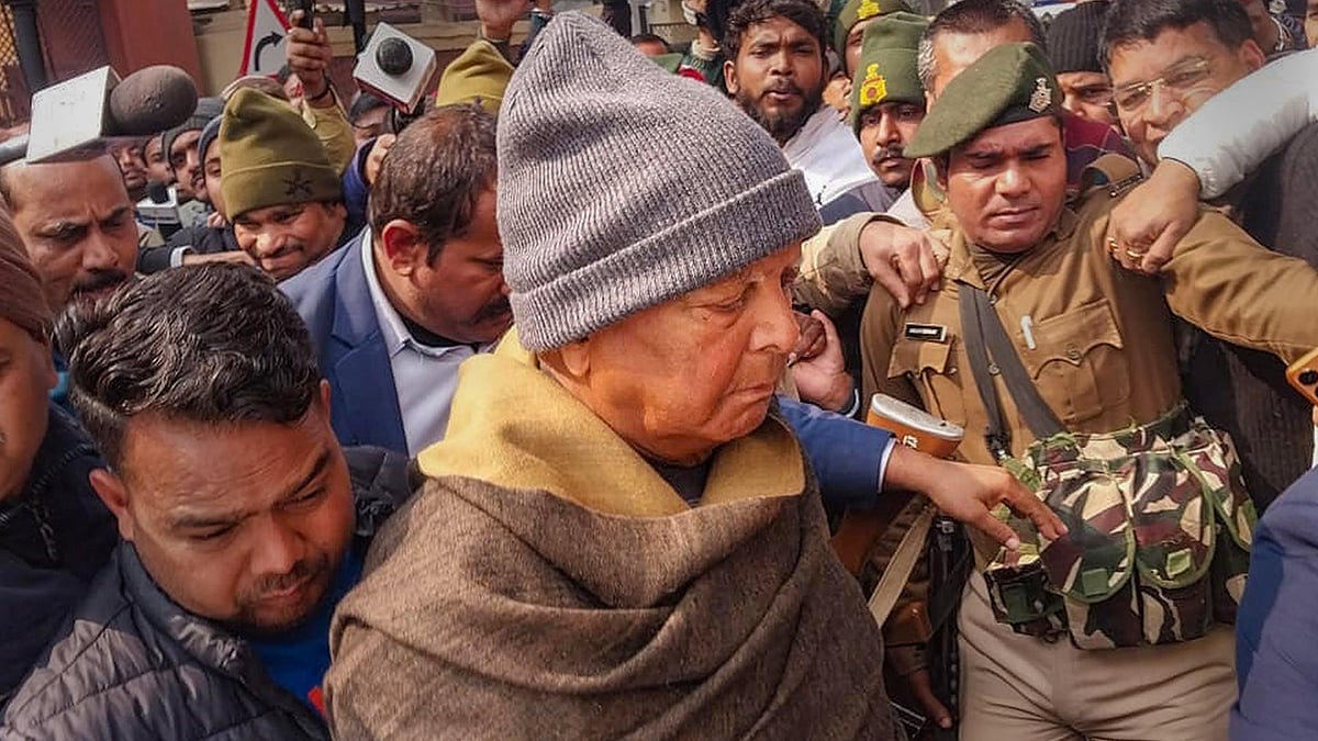 Photo: PTI : Lalu Yadav at ED office