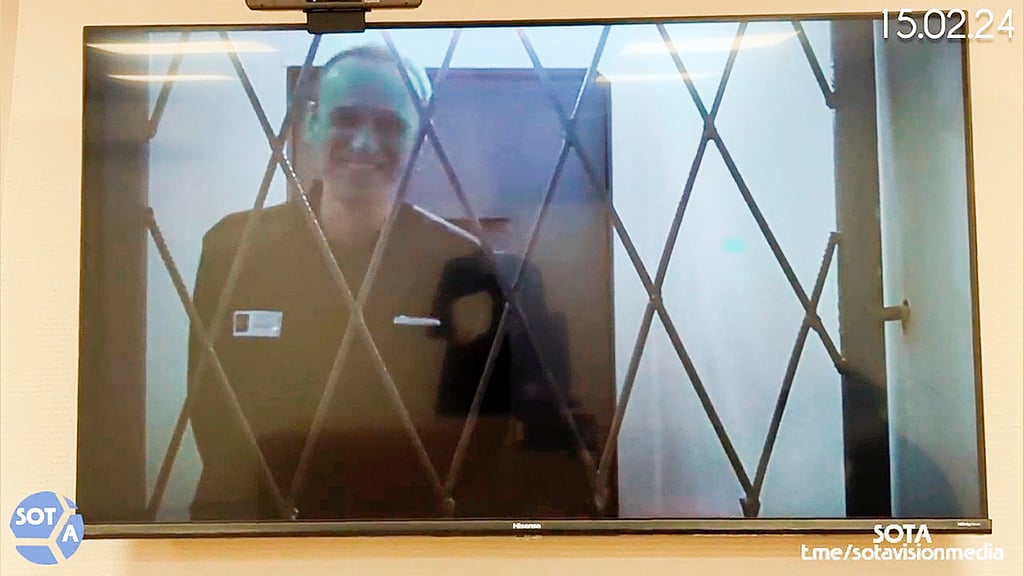 FILE This photo taken from video released by Russian Federal Penitentiary Service via SOTAVISION shows Russian opposition leader Alexei Navalny appears via a video link from the Arctic penal colony - AP