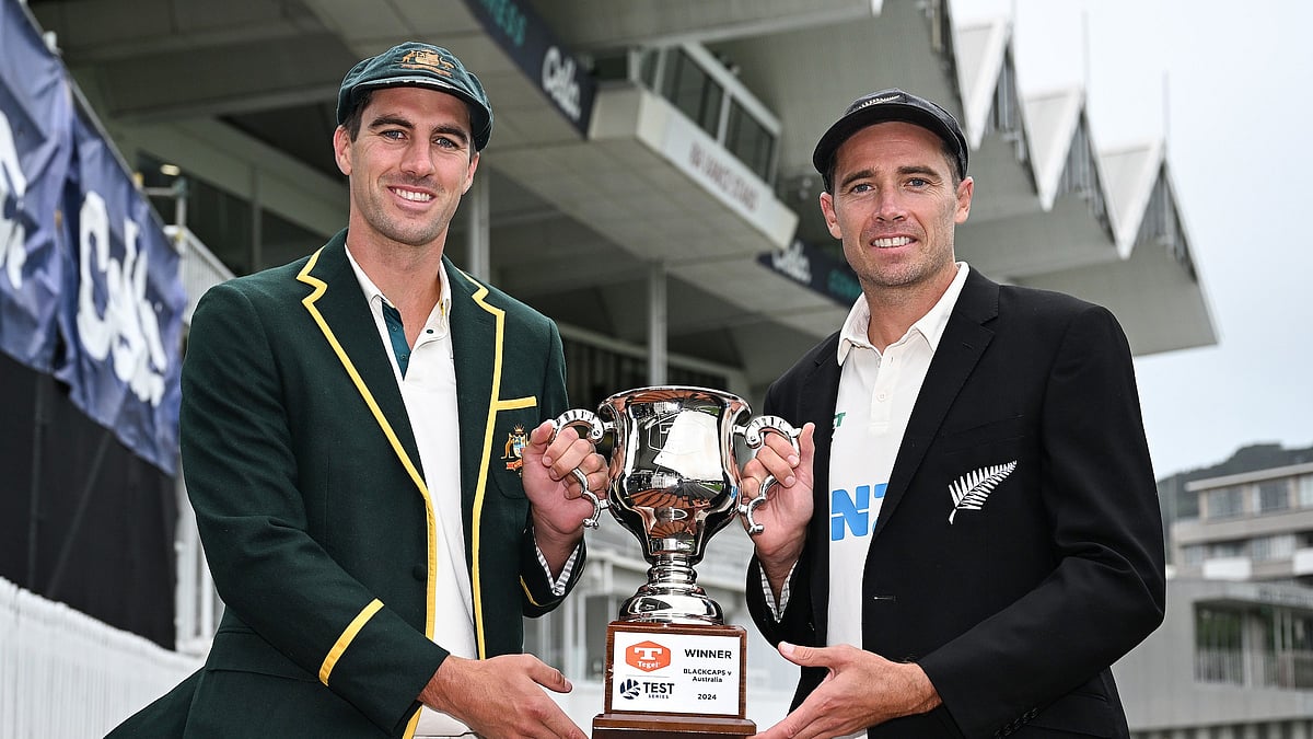 X/BlackCaps : Captains Pat Cummins (left) and Tim Southee pose with the trophy ahead of the first Test in Wellington.