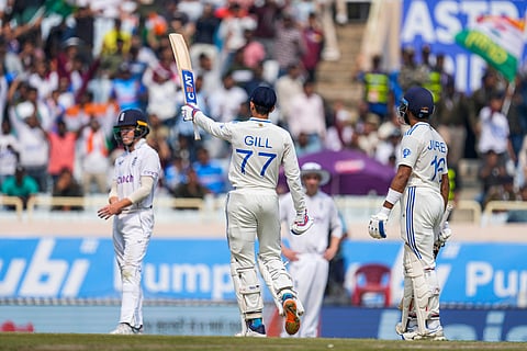 India's Shubman Gill, center celebrates his fifty runs on the fourth day of the fourth cricket test match between England and India in Ranchi, India, Monday, Feb. 26, 2024. 