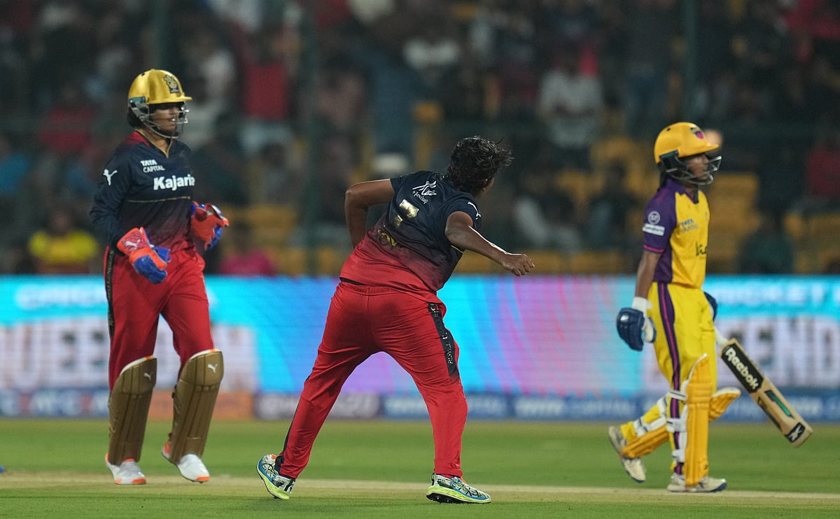 Asha Sobhana celebrates the wicket of Vrinda Dinesh during the Royal Challengers Bangalore vs UP Warriorz match in the Women's Premier League 2024 at the M Chinnaswamy Stadium on Saturday, February 24. - PTI