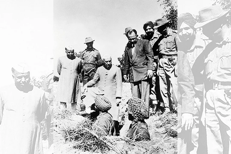 With the Troops: Former Defence Minister Y B Chavan and Jawaharlal Nehru on a visit to the trenches in Northeast India
- Photo: Getty Images