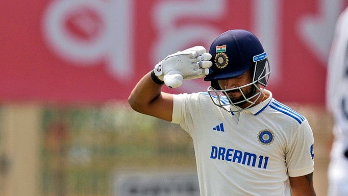 India's Dhruv Jurel gives a salute after completing his fifty runs on Day 3 of the 4th Test against England in Ranchi, February 25, 2024. - AP