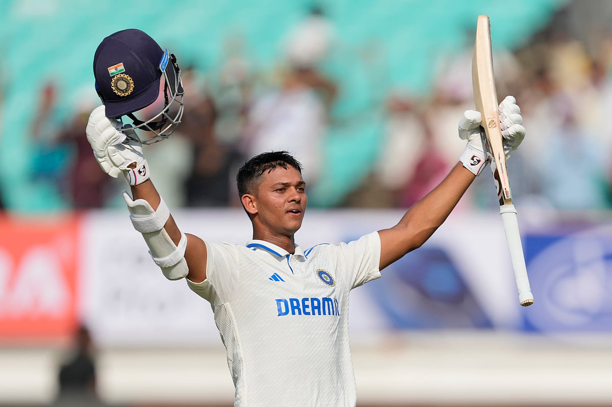 India opener Yashasvi Jaiswal celebrates his century against England on Day 3 of the third Test in Rajkot. - Ajit Solanki