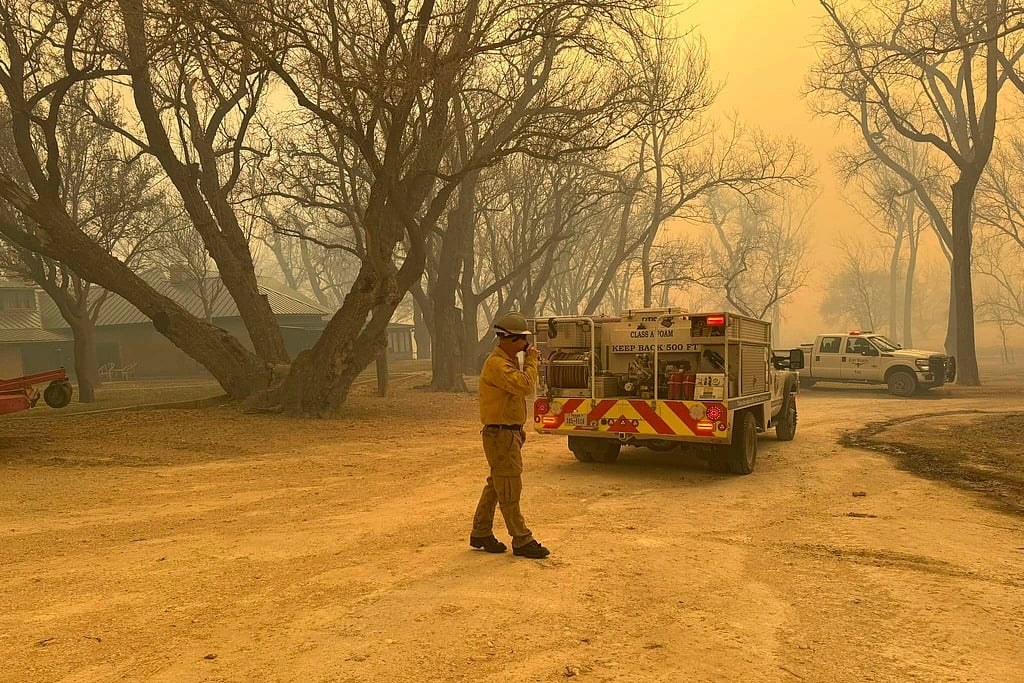 Wildfires prompting evacuation Texas. - AP
