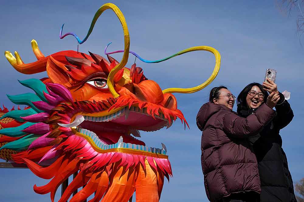 | Photo: AP/Andy Wong : China Lunar New Year