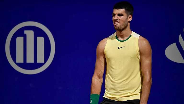 Carlos Alcaraz reacts after missing a point during his Argentina Open 2024 ATP semi-final tennis match against Nicolas Jarry at the Guillermo Vilas Stadium in Buenos Aires. - AP/Gustavo Garello