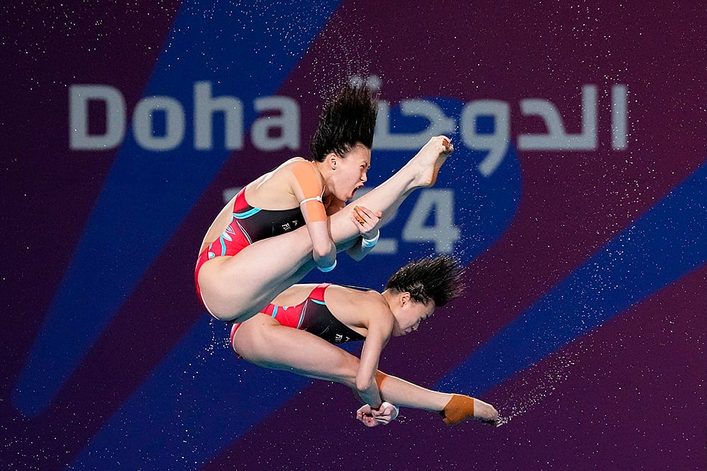 | Photo: AP/Hassan Ammar : World Aquatics Championships 2024