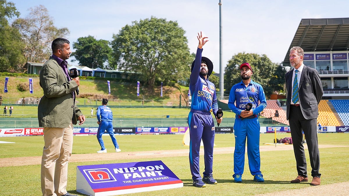 X/Afghanistan Cricket Board : Captains Kusal Mendis and Hashmatullah Shahidi at the toss for the first Afghanistan vs Sri Lanka ODI in Pallekele.