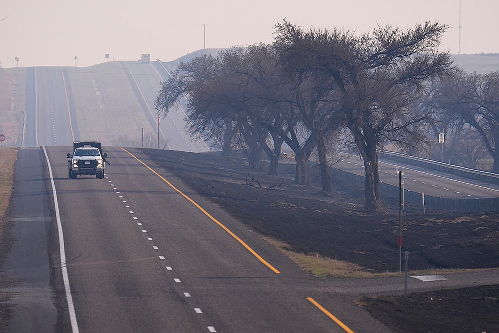 | Photo: AP/Julio Cortez : Texas Wildfires