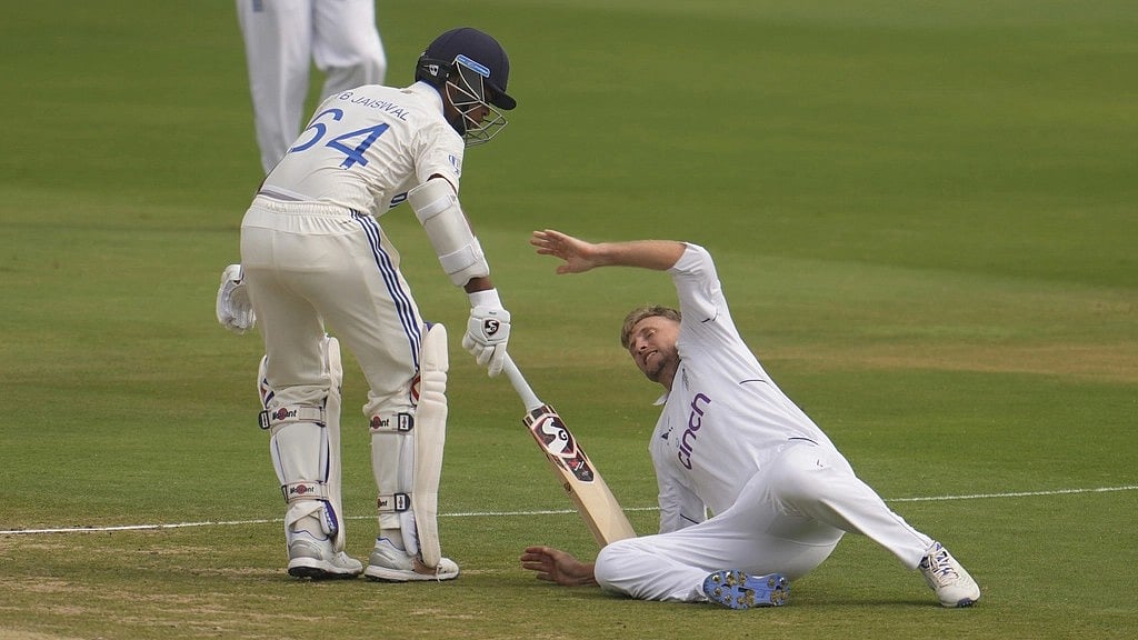 England's Joe Root falls after colliding with India's Yashasvi Jaiswal on the third day of the second test match between India and England in Visakhapatnam - AP Photo/Manish Swarup