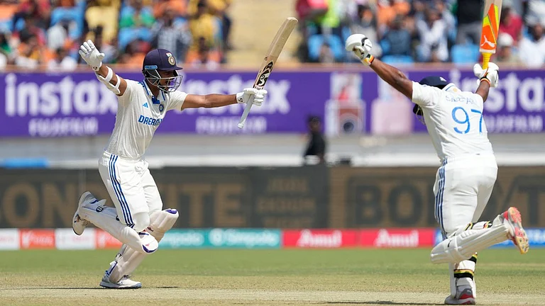 Yashasvi Jaiswal, left, and Sarfaraz Khan during Day 4's play of the India vs England third Test in Rajkot on February 18, 2024. - (Photo: AP)