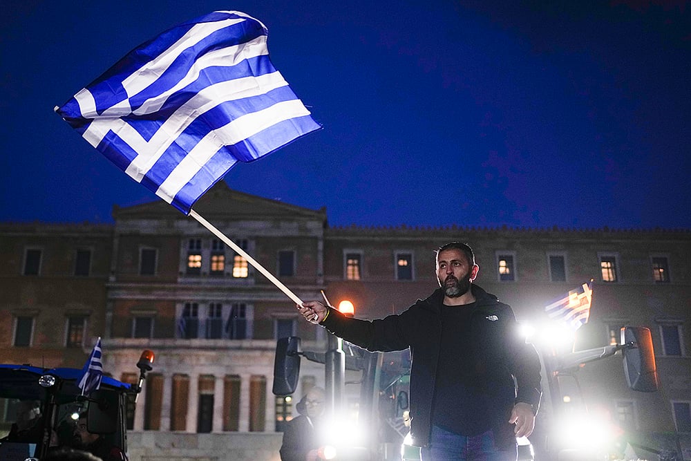 | Photo: AP/Thanassis Stavrakis : Greece Farmers Protest