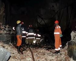 Firefighters at the paint factory in Delhi's Alipur | - X/@PTI_News