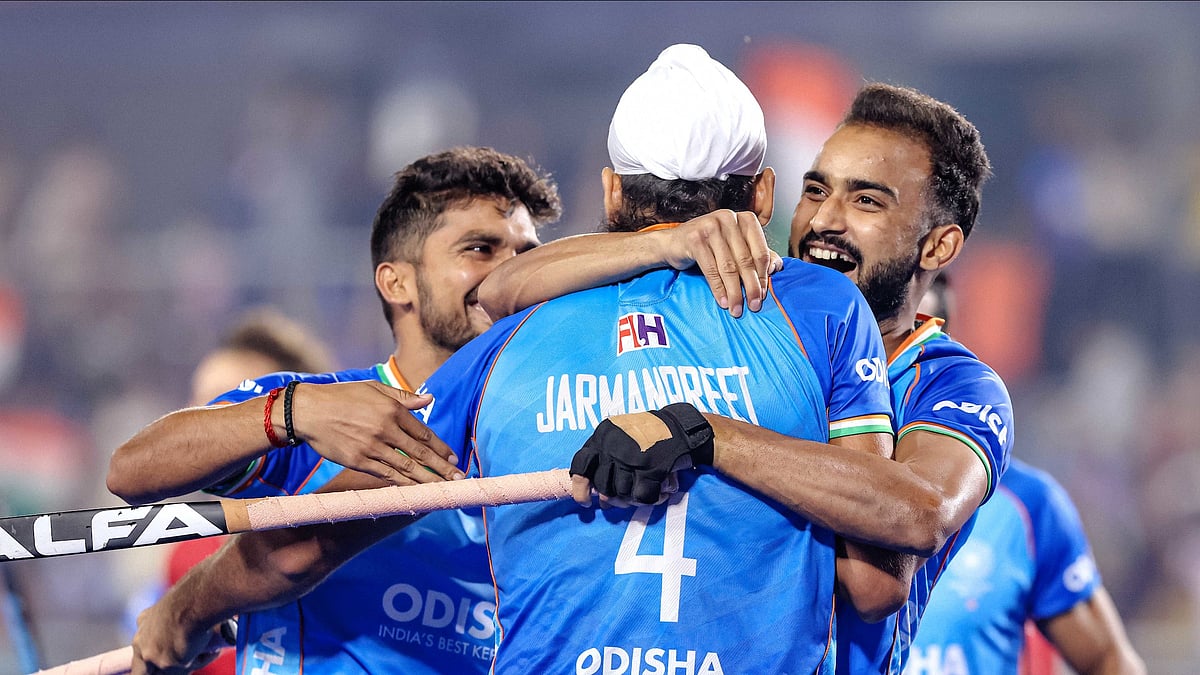 Photo Courtesy: X/ @FIH_Hockey : Indian players celebrating after a goal in the FIH Pro League game against Australia.