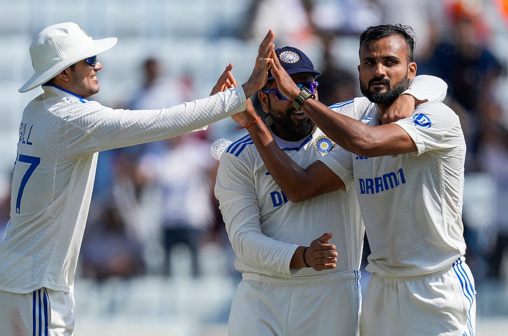 Akash Deep, right and Shubman Gill, left celebrate the wicket of Ben Duckett on the first day of the fourth cricket Test match between England and India in Ranchi. - AP/Ajit Solanki