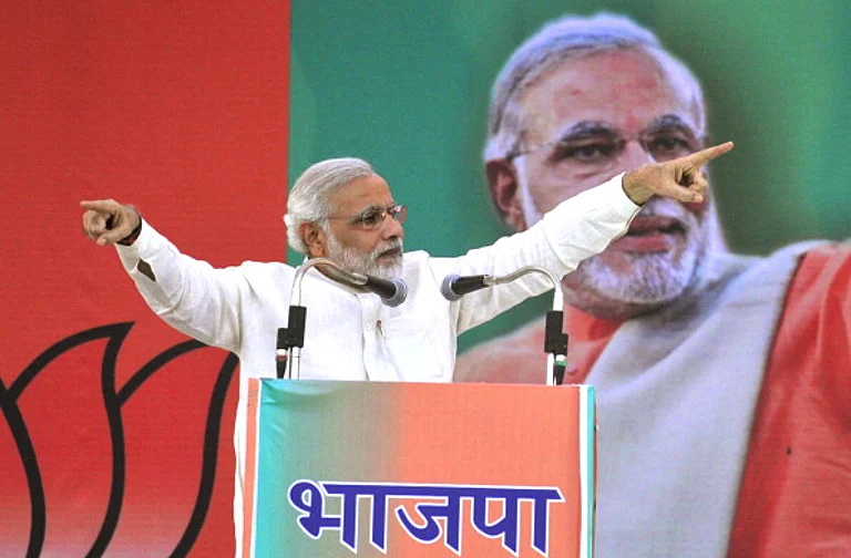 The-then Gujarat CM Narendra Modi during the BJP Janjaati Morcha Sammelan rally at Maharana Bhupal Stadium in 2013. - Getty Images