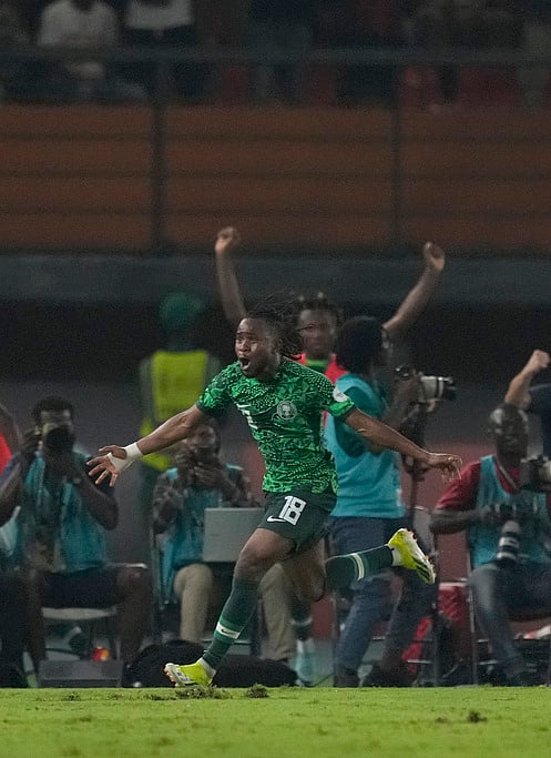 AP/Sunday Alamba : Nigeria's Ademola Lookman, left, celebrates with teammates after scoring his side's second goal during their Africa Cup of Nations 2023 round of 16 football match against Cameroon, at the Felix Houphouet Boigny stadium in Abidjan, Ivory Coast.