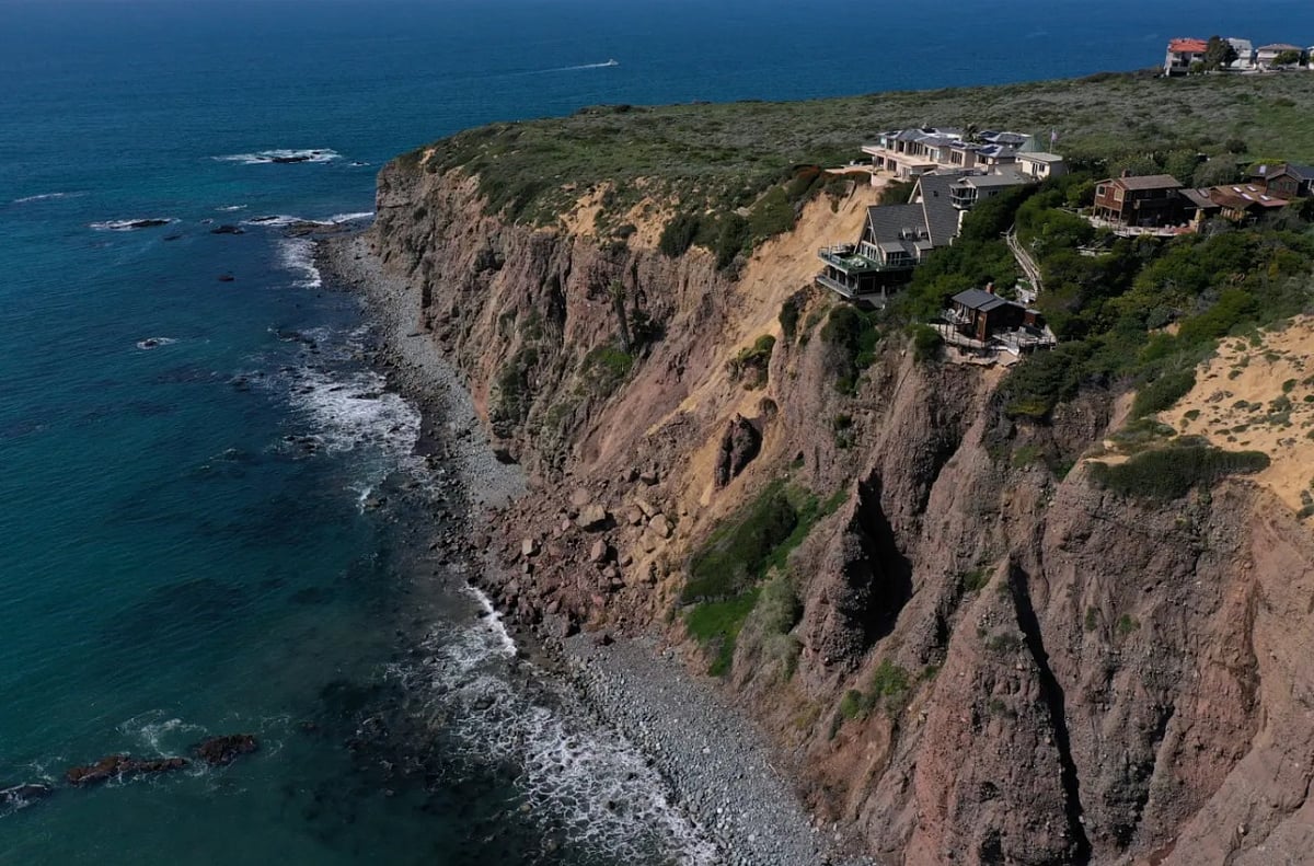 Three luxurious multimillion-dollar homes on the edge of a cliff - AP