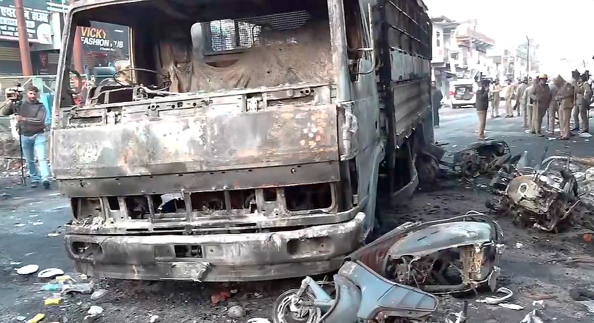 PTI : Charred remains of vehicles on a road in Uttarakhand's Haldwani after violence over demolition of a madrasa and a mosque