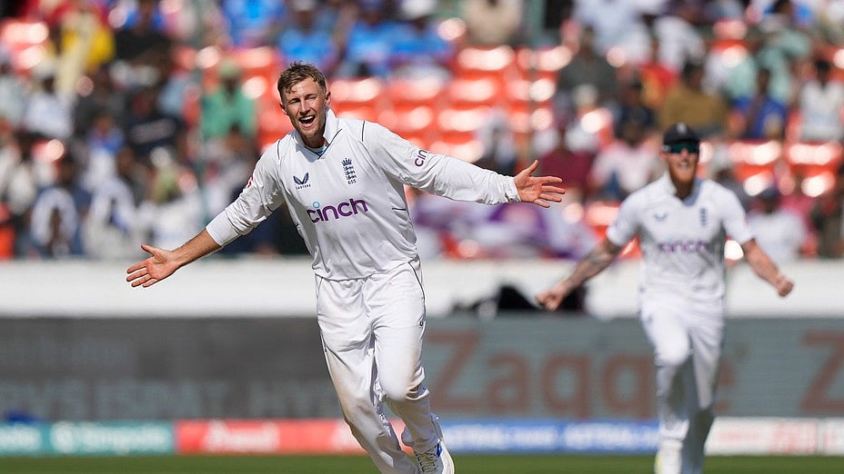 England's Joe Root, front, celebrating the wicket of India's KL Rahul on the fourth day of the first cricket test match between England and India in Hyderabad, India, Sunday, Jan. 28, 2024. -  (AP Photo/Mahesh Kumar A.)