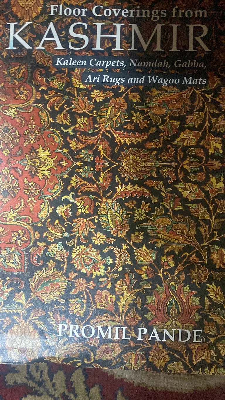 Cover of 'Floor Coverings from Kashmir: Kaleen carpets, Namdah, Gabba and Ari Rugs and Wagoo Mats' by Promil Pande. - null