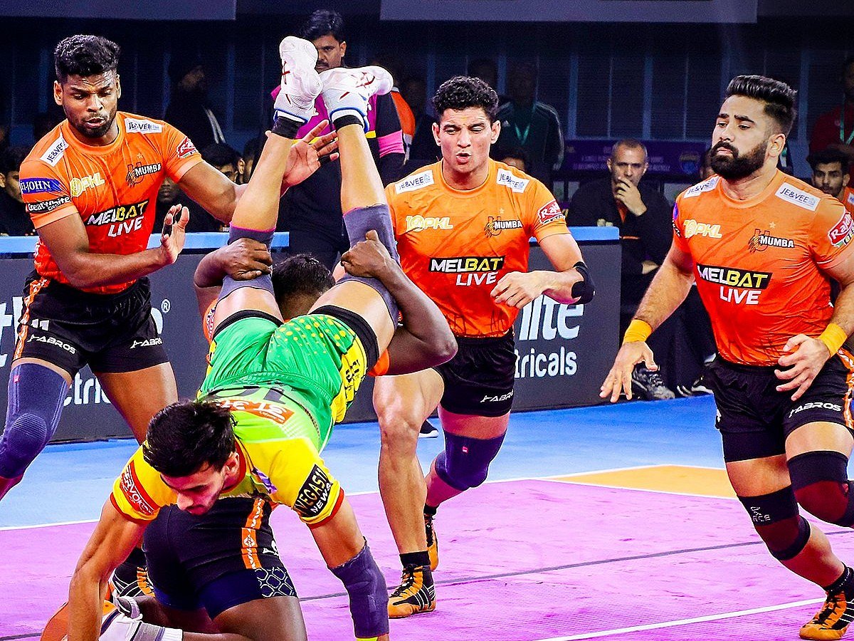 X/ @ProKabaddi : U Mumba players trying to tackle a Patna Pirate player on Saturday in PKL 2023-24.