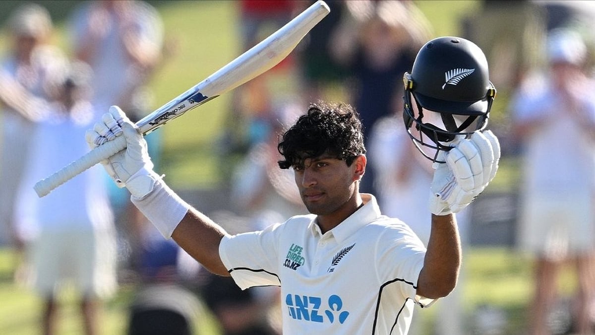 Rachin Ravindra takes in the applause from the crowd after bring up his maiden double ton. - Photo - X/CricCrazyJohns