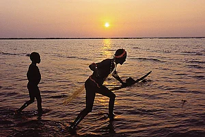 Photo: Getty Images : In Isolation: Jarawas fishing
on a coral reef