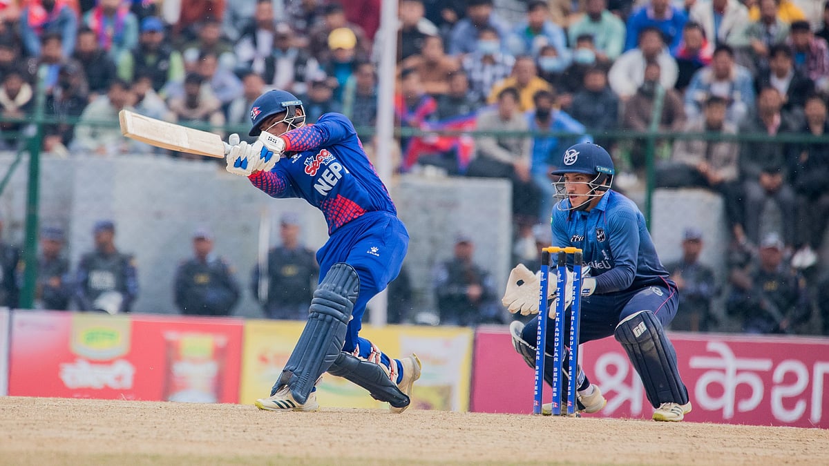 Photo: X/ @CricketNep : Nepal player batting against Namibia in the Nepal T20I Tri-Series 2024.