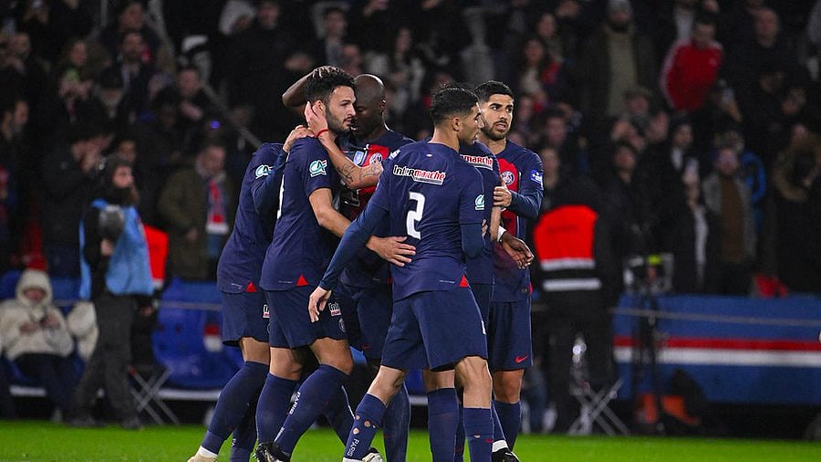 Photo Courtesy: X/ @PSG_English : Paris Saint-Germain teammates celebrating after a goal.