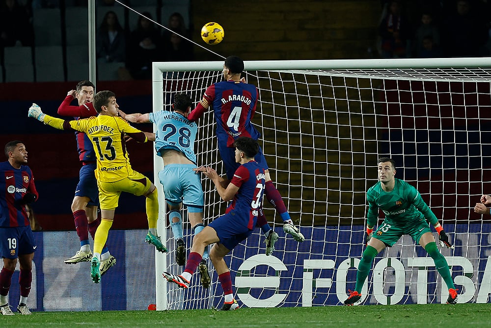Photo: AP/Joan Monfort : La Liga: Barcelona vs Osasuna