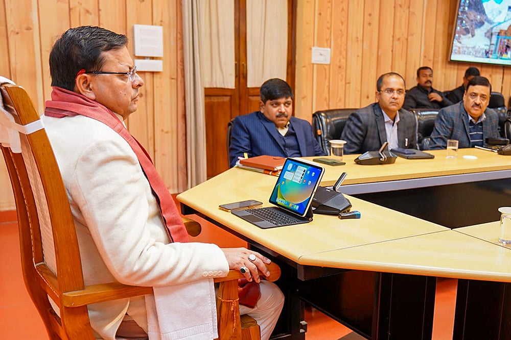 CM Dhami meets officials in Dehradun