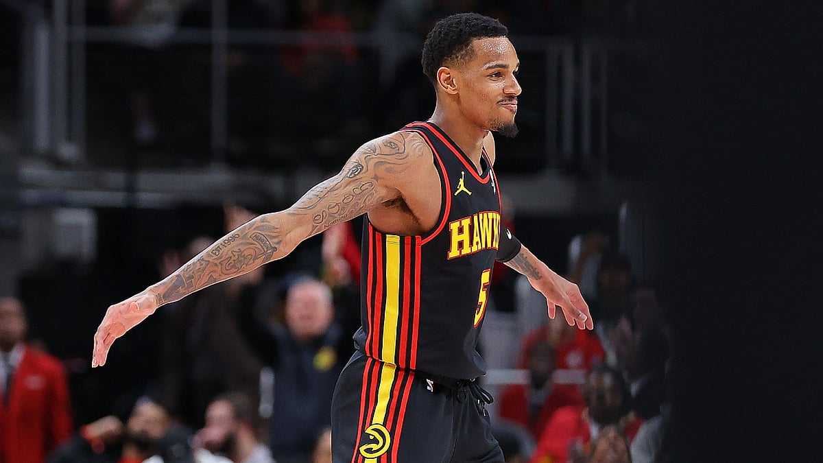 Dejounte Murray celebrates after making a 3-pointer against the Boston Celtics.
