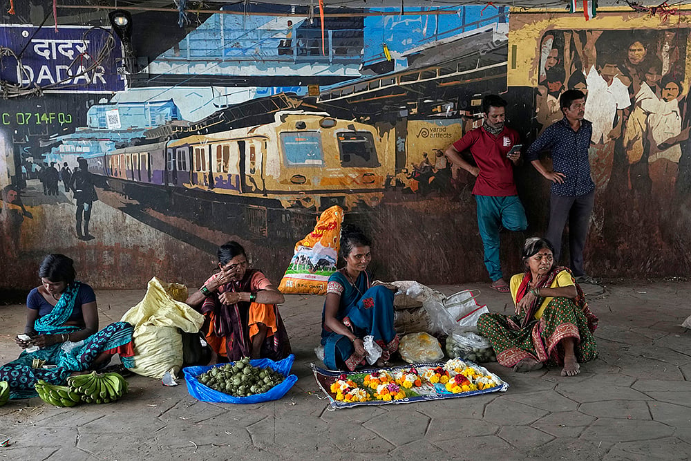| Photo: AP/Rajanish Kakade : International Woman's Day