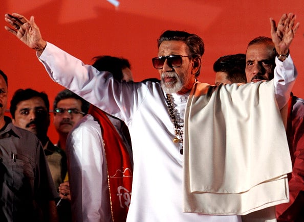Manoj Patil/Hindustan Times Via Getty Images : Shiv Sena supremo Balasaheb Thackeray opens the campaign of the BMC polls for the party at Goregaon on December 27, 2006 in Mumbai, India. For the first time Thackeray delivered a speech by sitting down