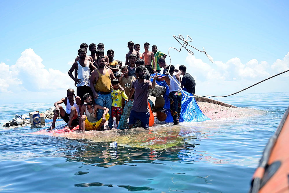 | Photo: AP/Reza Saifullah : Indonesia Rohingya Muslims